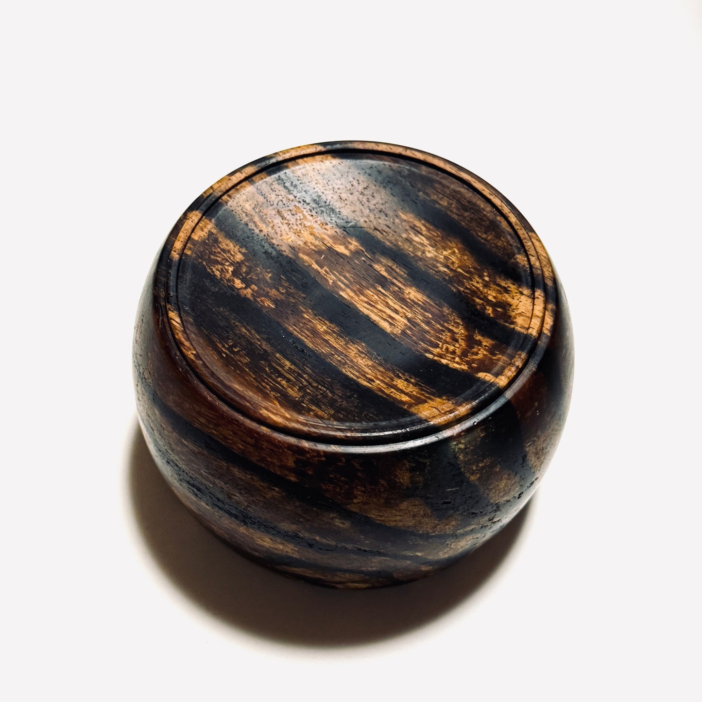 Black persimmon wood incense burner, titled "Genyo" (approximately 100mm in diameter)